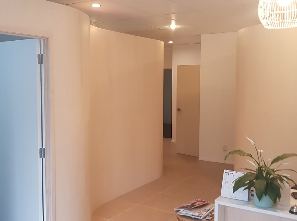 Flat Bush clinic interior — modern curved rooms